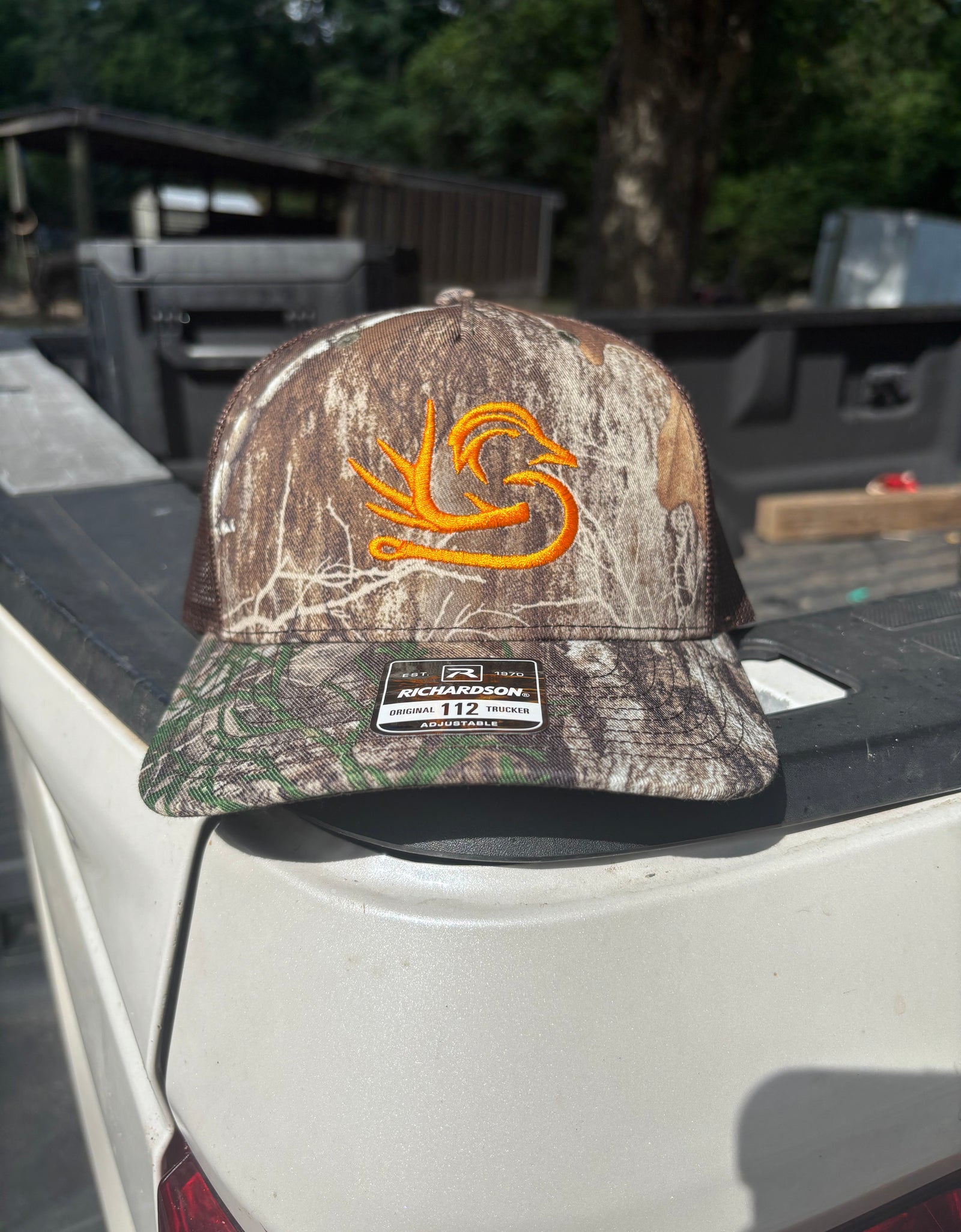 Southern Down Outfitters Richardson Real Tree Edge Orange Logo Hat